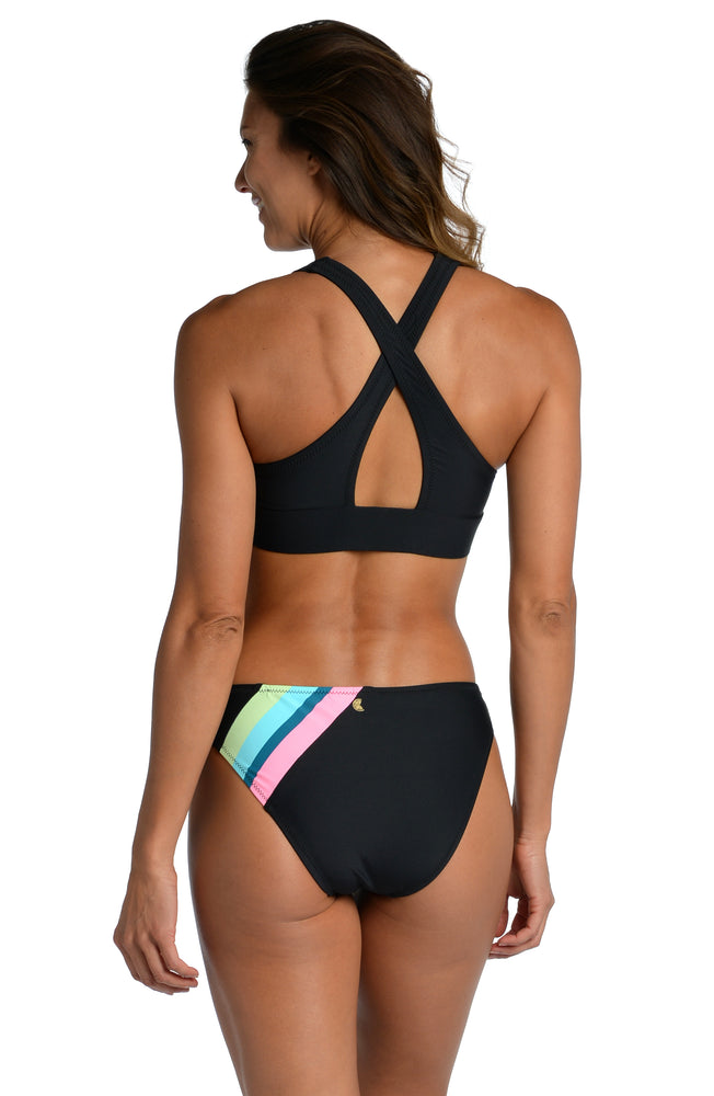 
            
                Load image into Gallery viewer, Model is wearing a vibrant colorblock against a solid black ground printed high neck midkini top from our Colorblock collection!
            
        