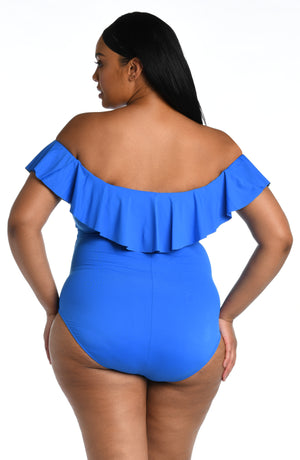 
            
                Load image into Gallery viewer, Model is wearing a capri blue colored one piece swimsuit from our Best-Selling Island Goddess collection.
            
        