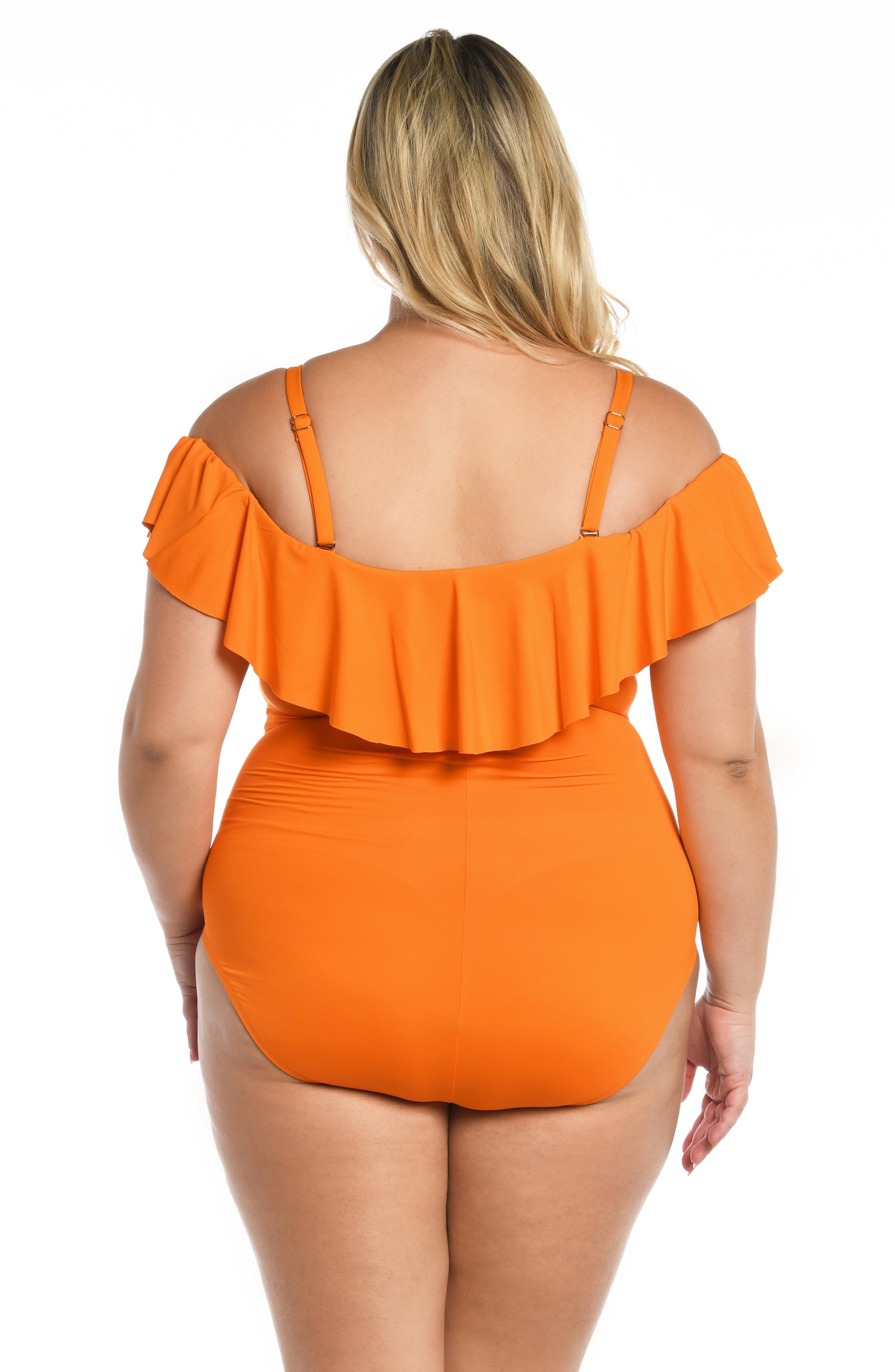 Model is wearing a tangerine colored one piece swimsuit from our Best-Selling Island Goddess collection.