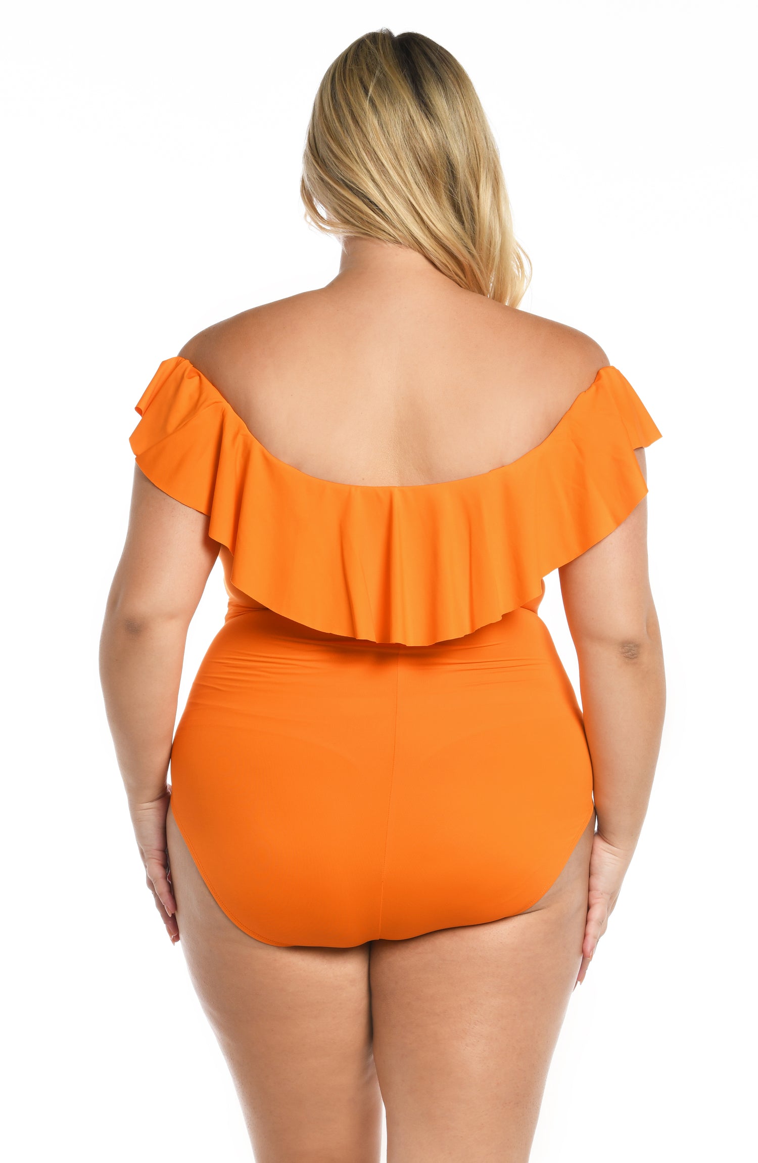 Model is wearing a tangerine colored one piece swimsuit from our Best-Selling Island Goddess collection.