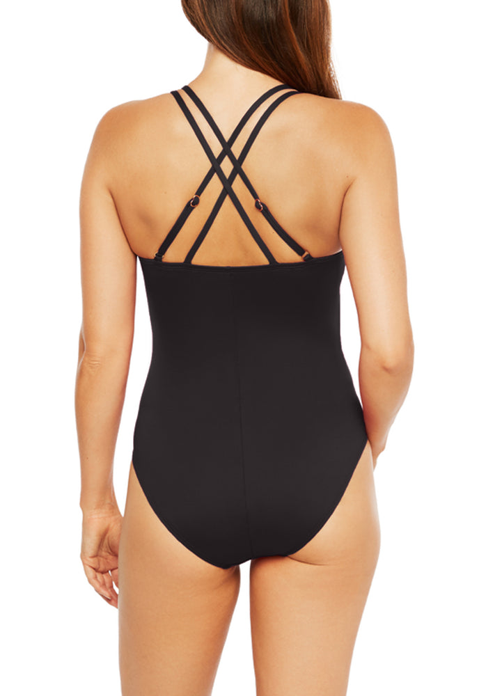 Model is wearing a solid black underwire cross back one piece swimsuit from our best selling Island Goddess collection.