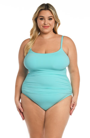 
            
                Load image into Gallery viewer, Model is wearing a ice blue colored one piece swimsuit from our Best-Selling Island Goddess collection.
            
        