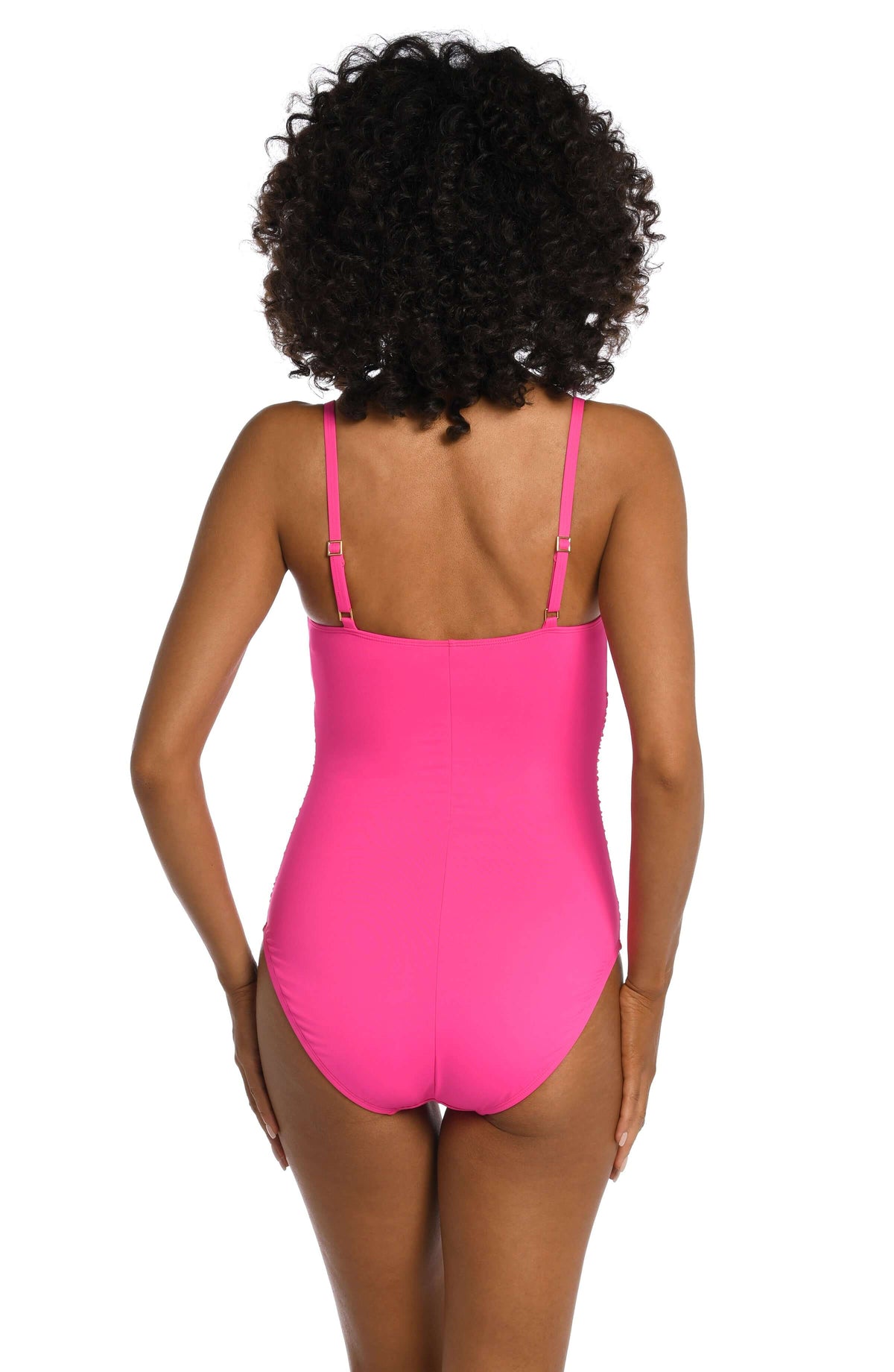 Model is wearing a pop pink colored one piece swimsuit from our Best-Selling Island Goddess collection.