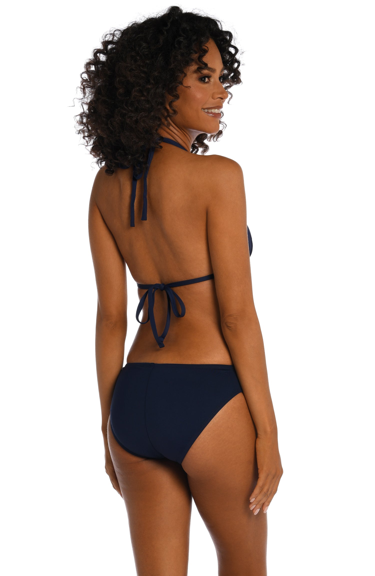 Model is wearing a indigo colored halter triangle swimsuit top from our Best-Selling Island Goddess collection.