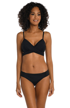 Model is wearing a black underwire bikini swimsuit top from our Best-Selling Island Goddess collection.