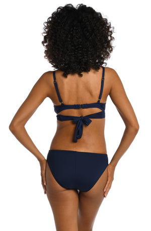Model is wearing a indigo colored underwire swimsuit top from our Best-Selling Island Goddess collection.