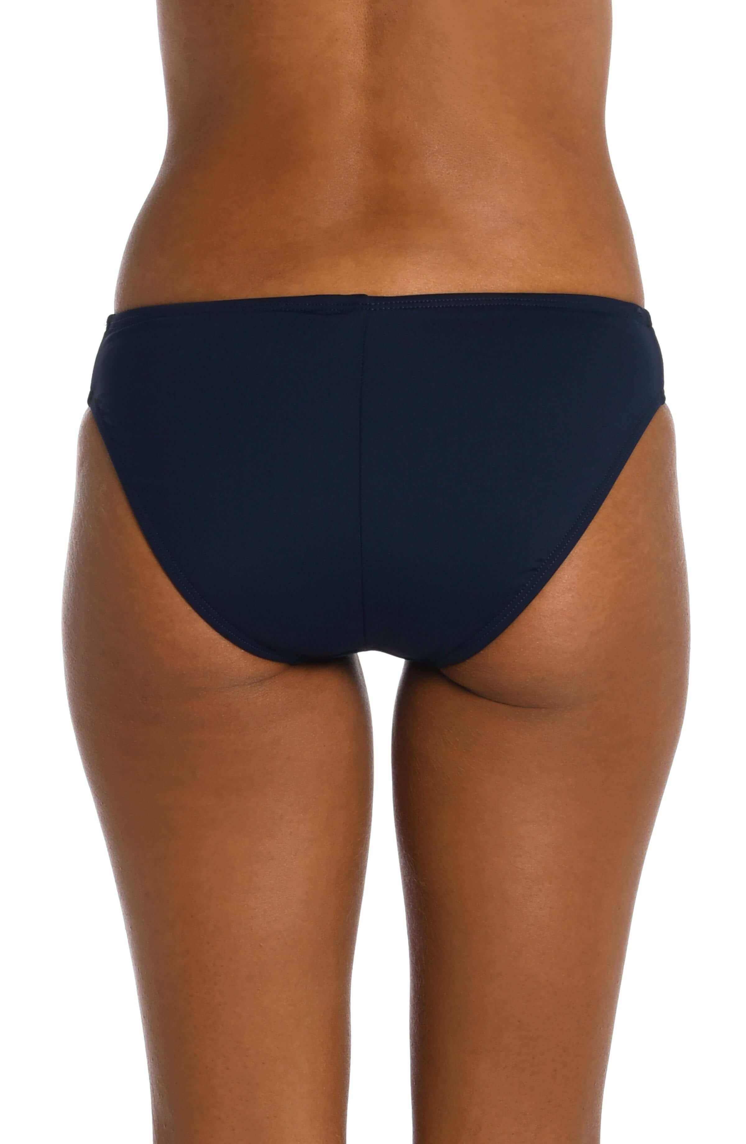 Model is wearing a indigo colored hipster swimsuit bottom from our Best-Selling Island Goddess collection.