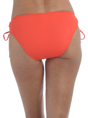 Model is wearing a paprika colored side-tie swimsuit bottom from our Best-Selling Island Goddess collection.