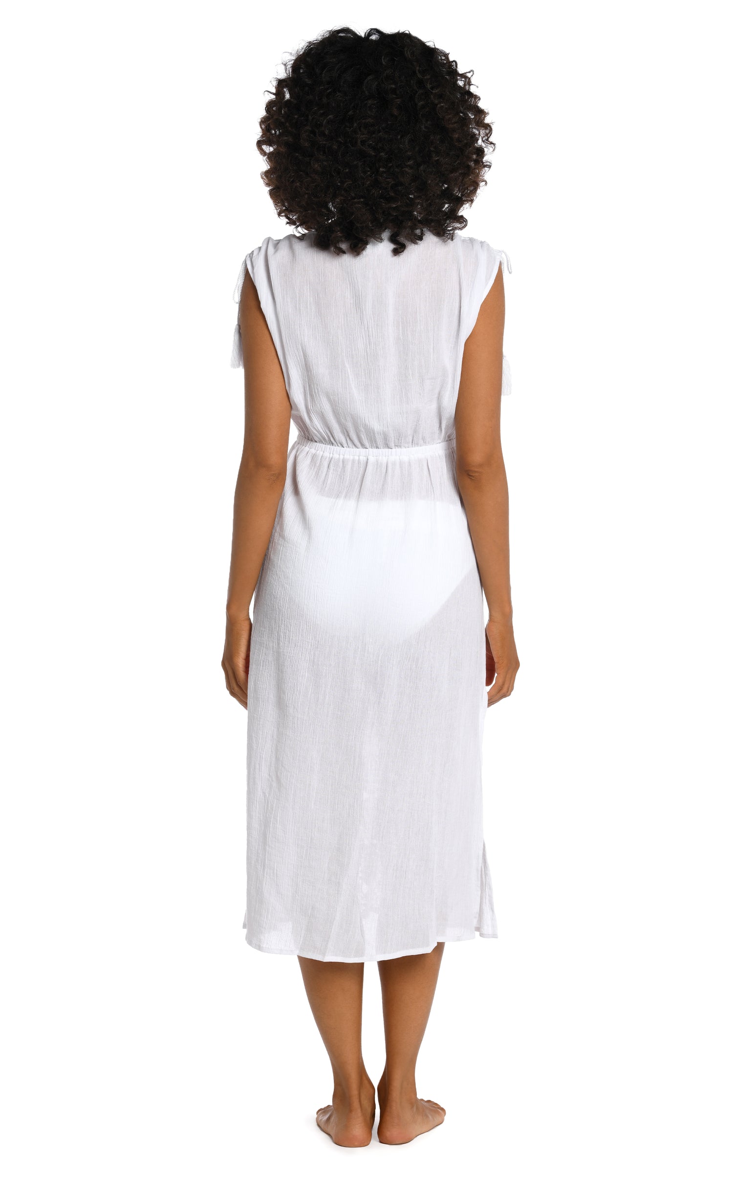 Model is wearing a white mid-length dress swimsuit cover up from our Island Fare collection.