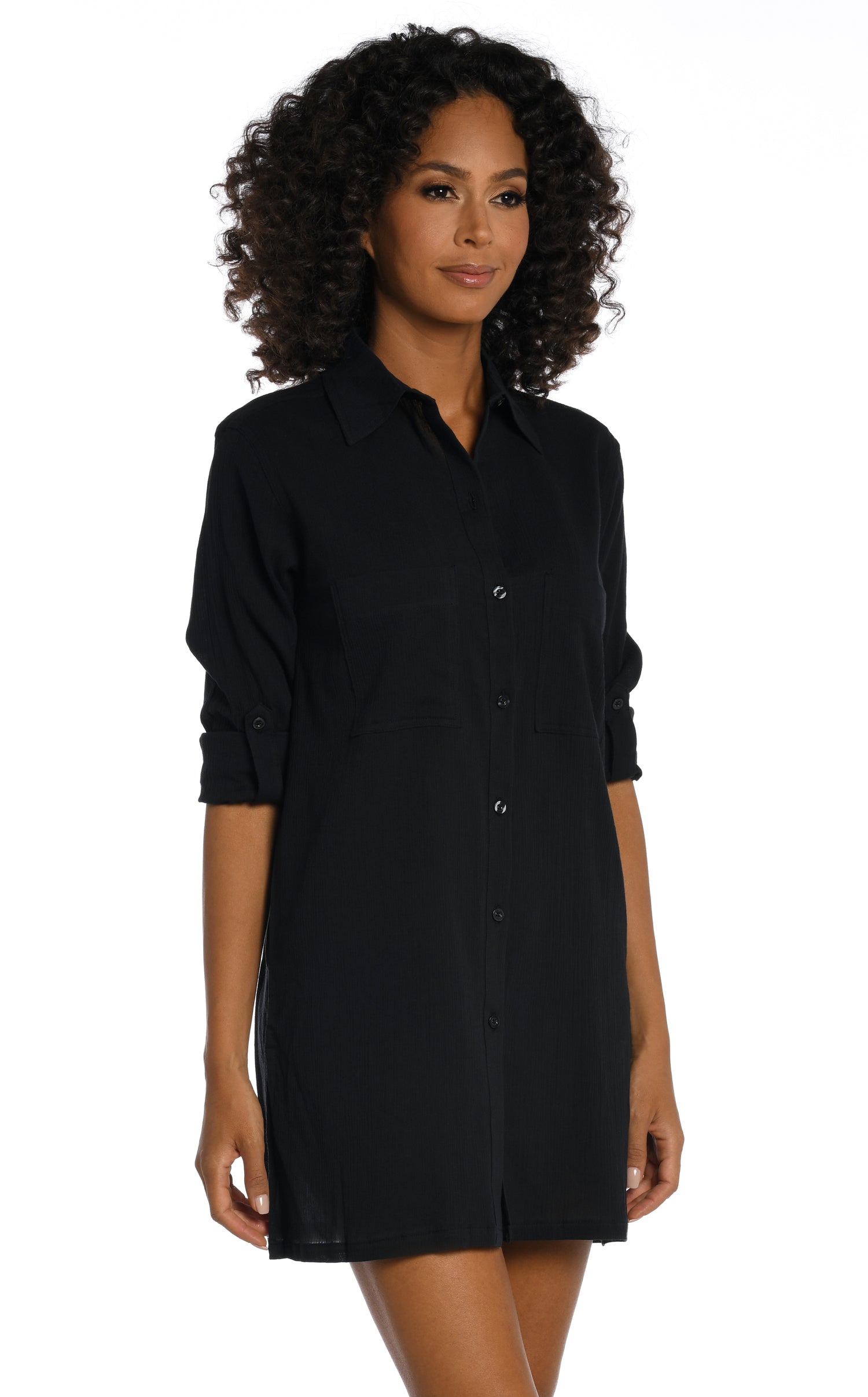 Model is wearing a black button shirt swimsuit cover up from our Island Fare collection.
