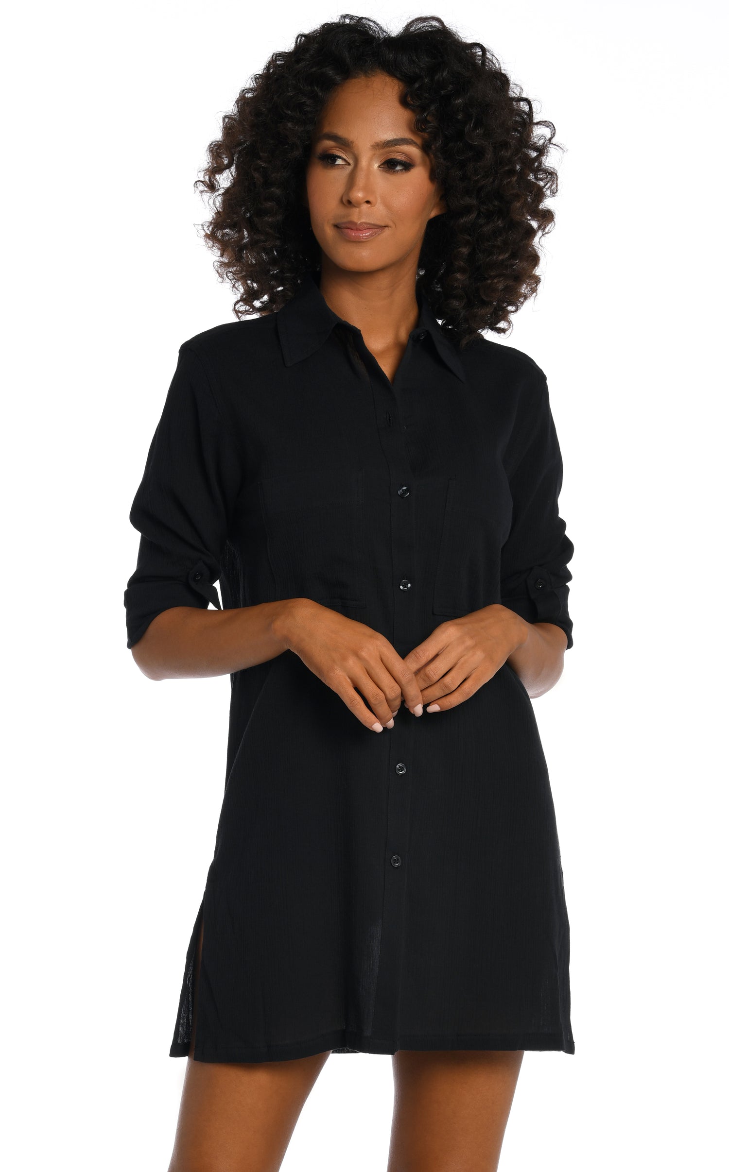 Model is wearing a black button shirt swimsuit cover up from our Island Fare collection.