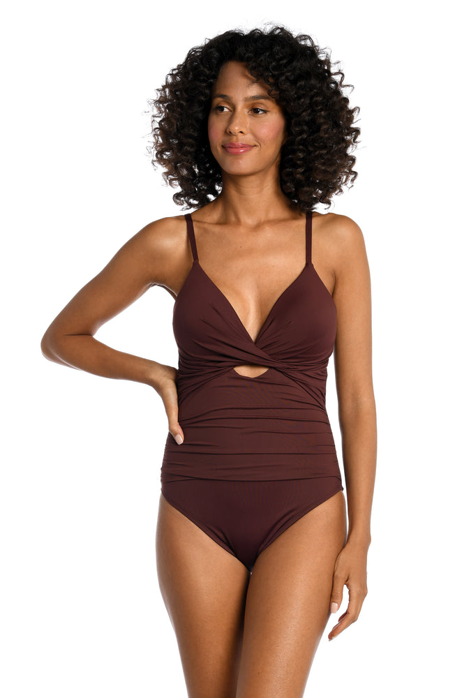 
            
                Load image into Gallery viewer, Model is wearing a java colored one piece swimsuit from our Best-Selling Island Goddess collection.
            
        