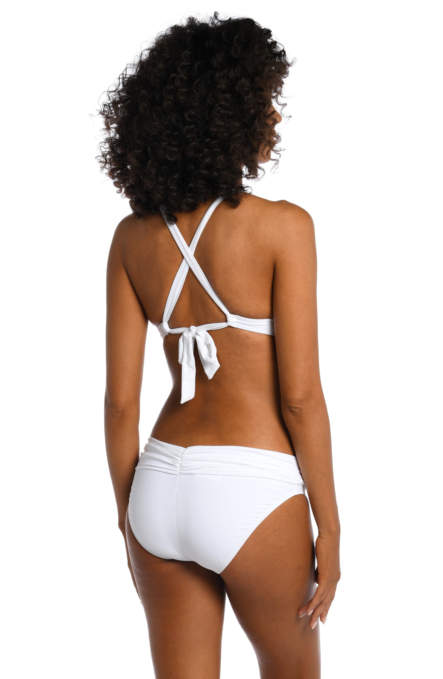 Model is wearing a white twist front swimsuit top from our Best-Selling Island Goddess collection.