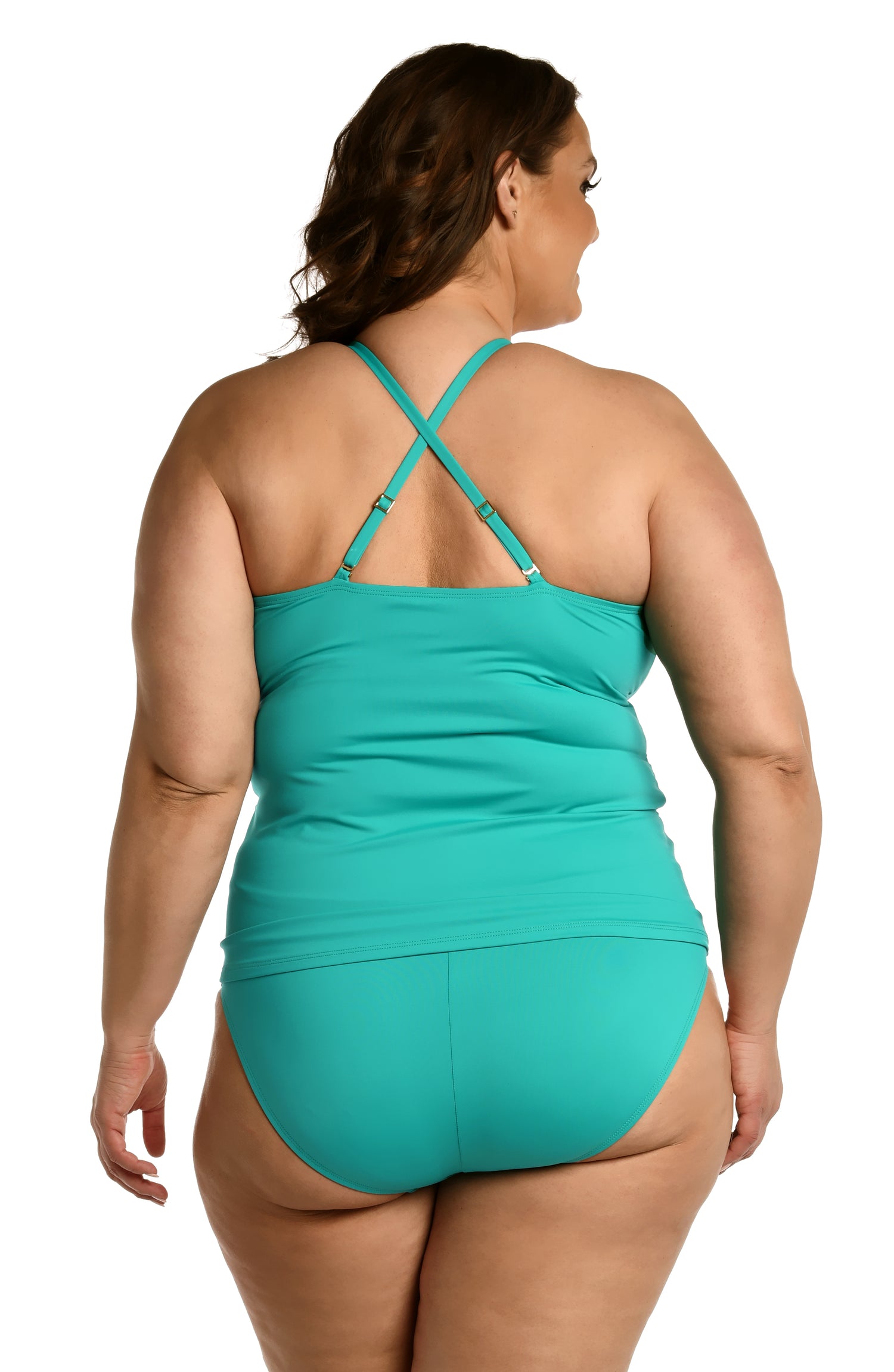 Model is wearing a emerald colored keyhole tankini swimsuit top from our Best-Selling Island Goddess collection.