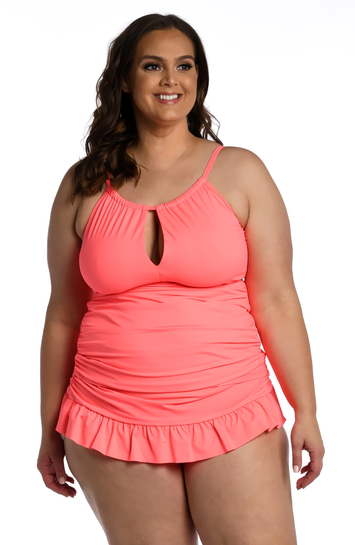 Model is wearing a hot coral colored keyhole tankini swimsuit top from our Best-Selling Island Goddess collection.