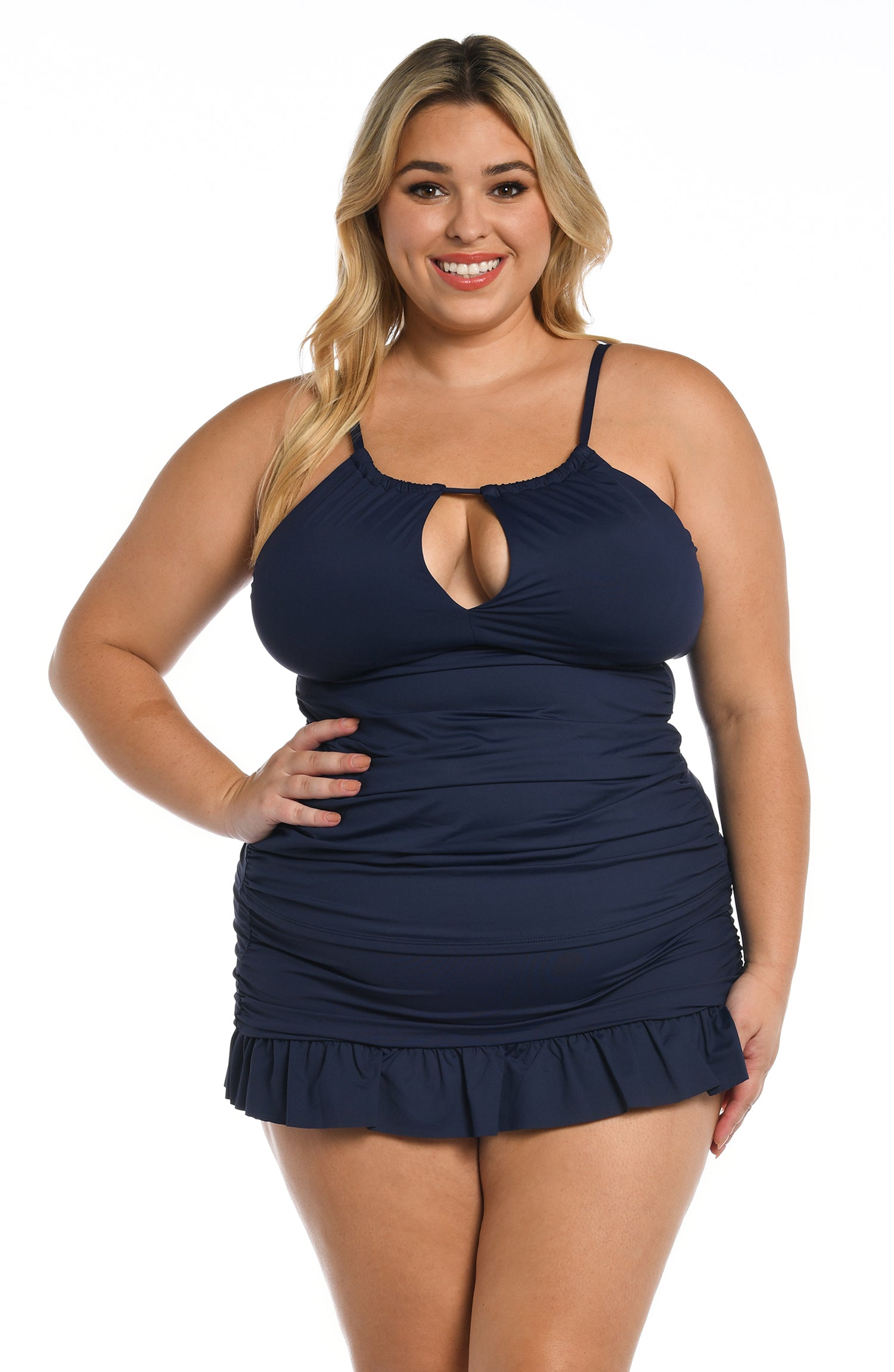Model is wearing a indigo colored keyhole tankini swimsuit top from our Best-Selling Island Goddess collection.