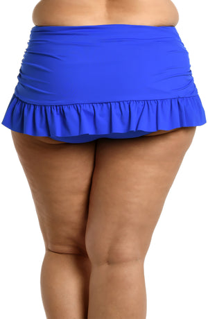 Model is wearing a sapphire colored ruffle skirted swimsuit bottom from our Best-Selling Island Goddess collection.