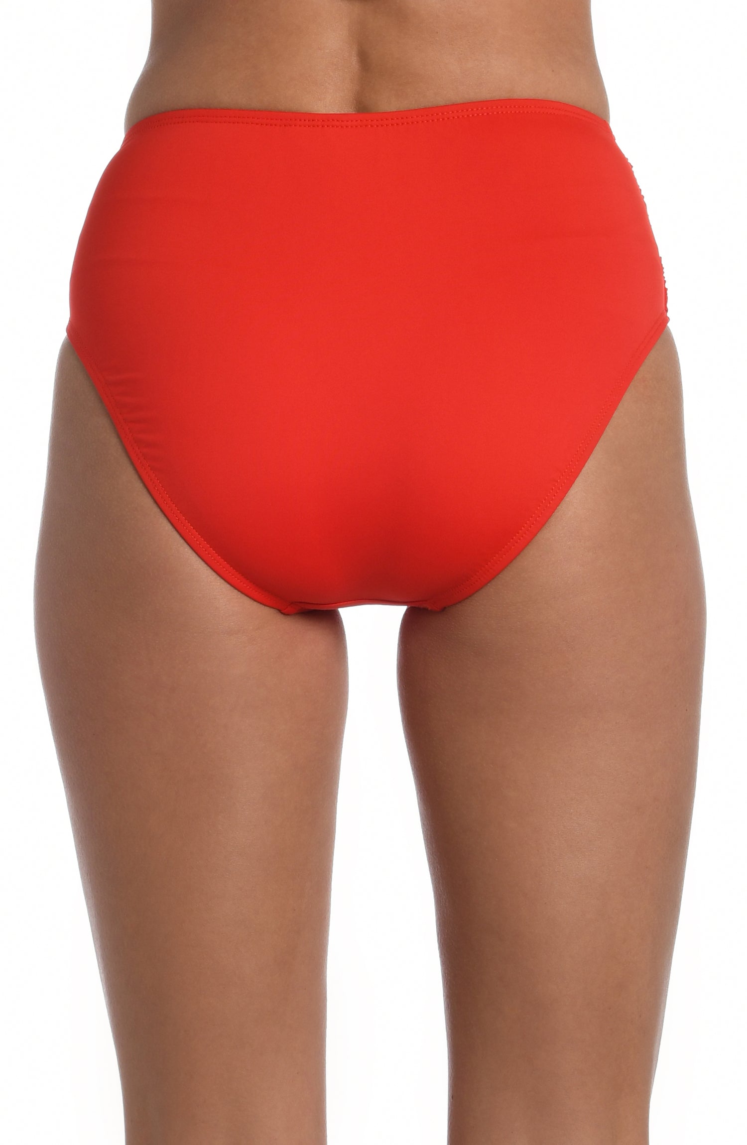 Model is wearing a cherry colored high waist swimsuit bottom from our Best-Selling Island Goddess collection.