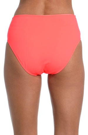 
            
                Load image into Gallery viewer, Model is wearing a hot coral colored high waist swimsuit bottom from our Best-Selling Island Goddess collection.
            
        