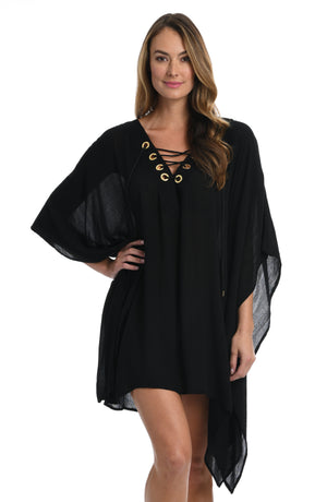 
            
                Load image into Gallery viewer, Model is wearing a black colored lace front caftan cover up fom our Apulia Mix collection.
            
        