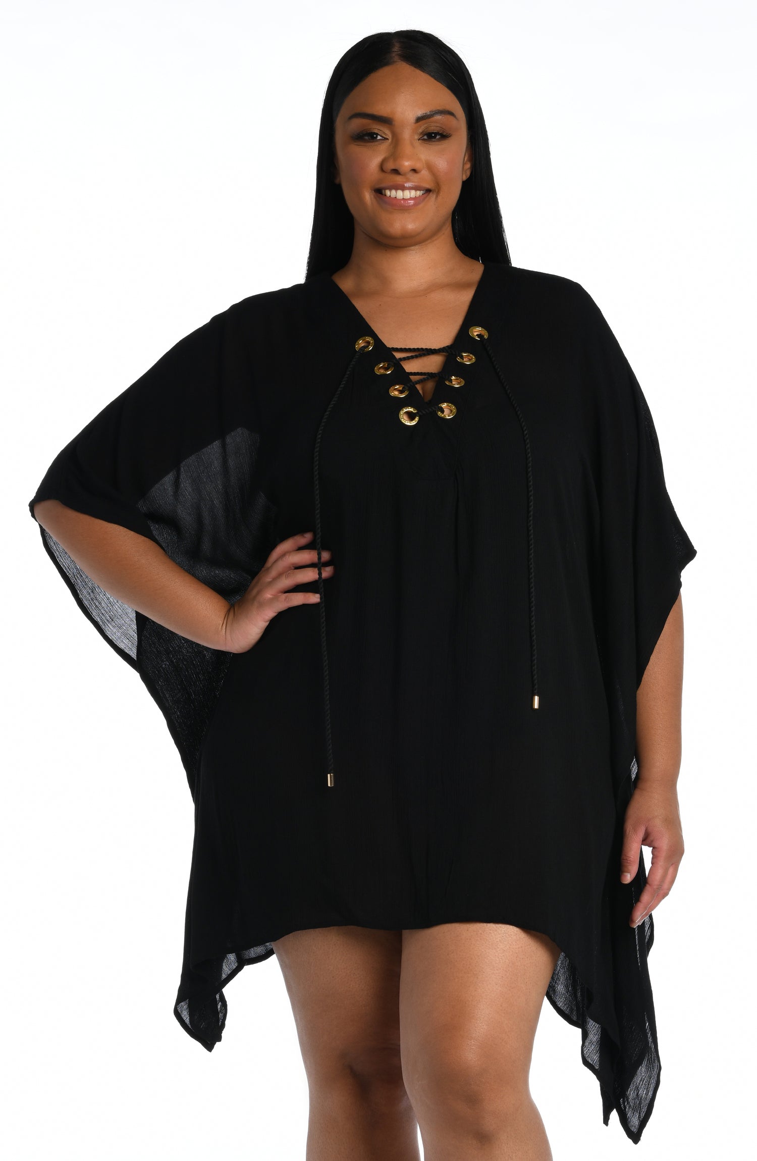 Model is wearing a black colored lace front caftan cover up fom our Apulia Mix collection.