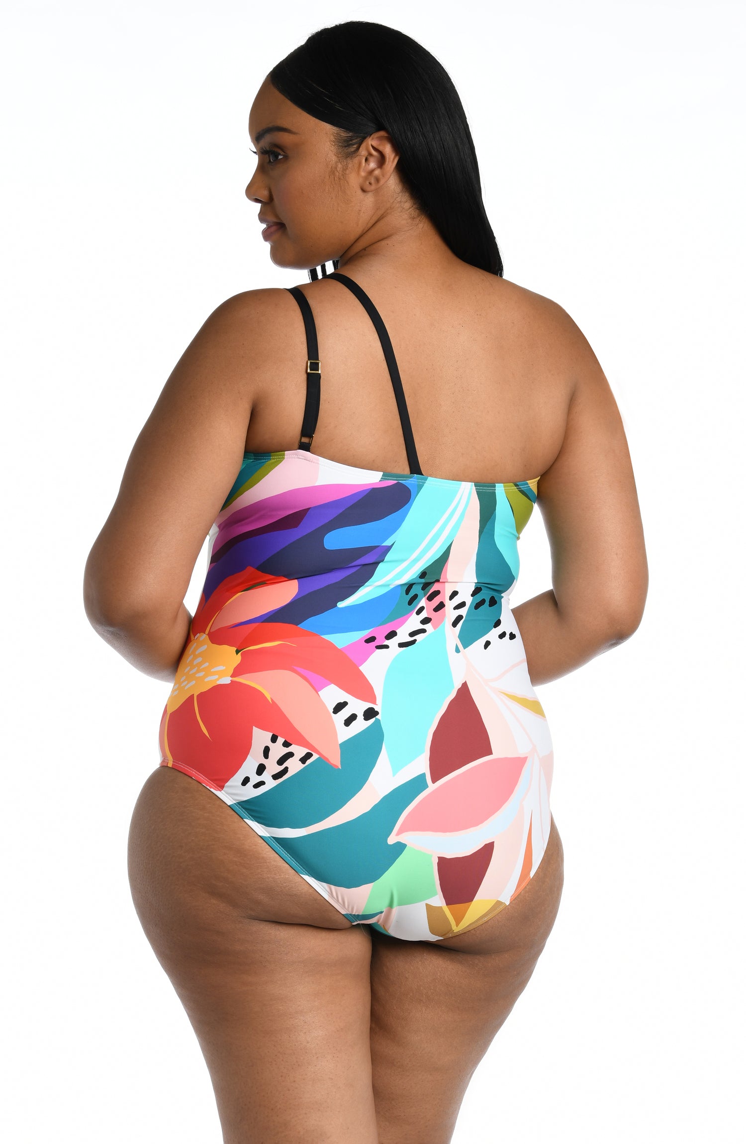 Model is wearing a multi colored tropical printed one piece swimsuit from our Eclectic Shore collection.