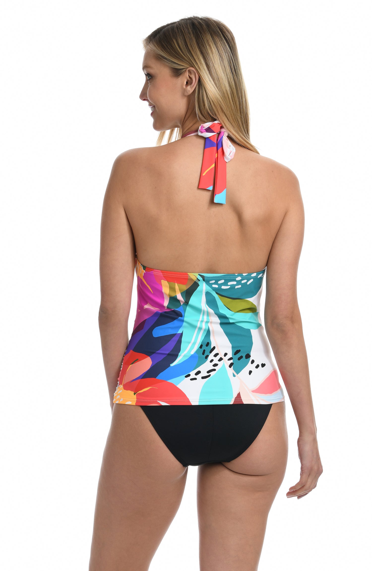 Model is wearing a multi colored tropical printed halter tankini swimsuit top from our Eclectic Shore collection.