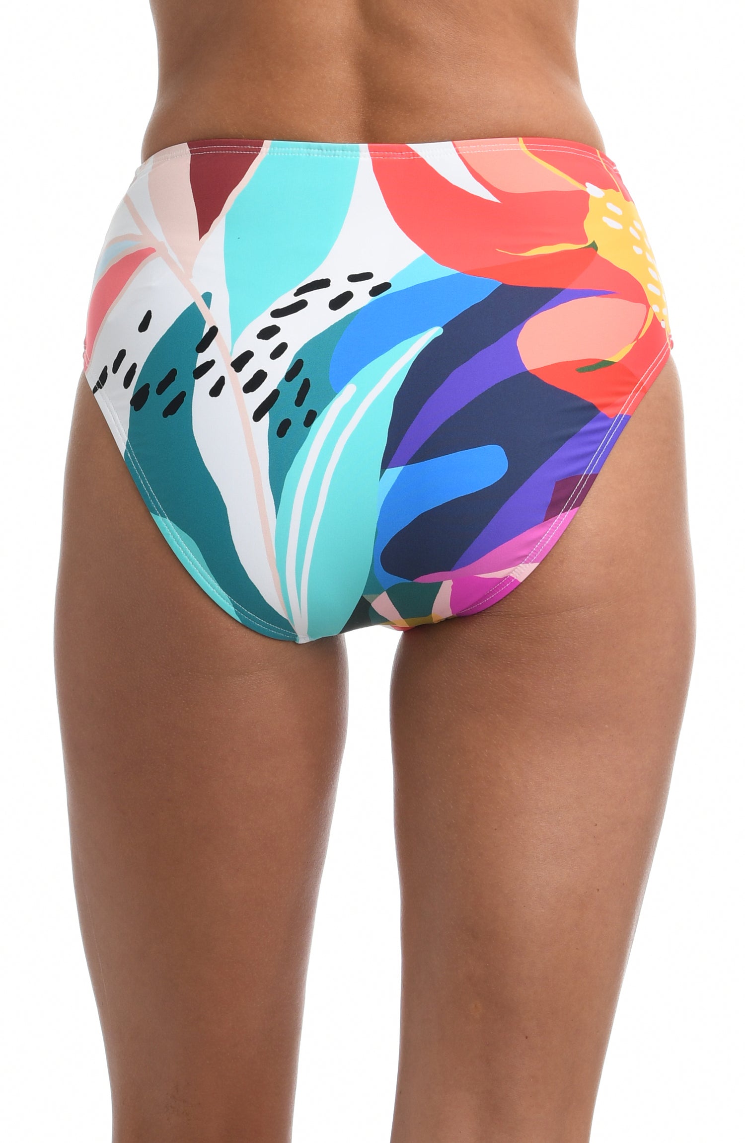 Model is wearing a multi colored tropical printed high waist swimsuit bottom from our Eclectic Shore collection.