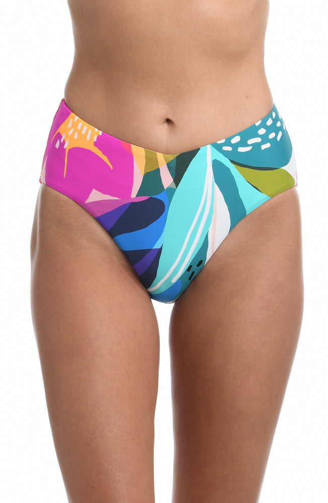 
            
                Load image into Gallery viewer, Model is wearing a multi colored tropical printed high waist swimsuit bottom from our Eclectic Shore collection.
            
        