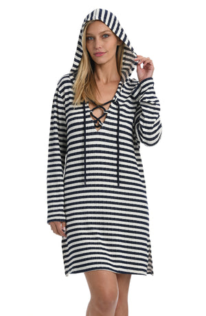 Model is wearing an indigo striped v-neck cover up tunic from our Static Stripe collection!