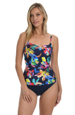 Model is wearing a multi-colored tropical printed tankini swimsuit top from our By the Sea collection.