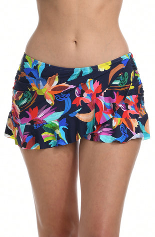 Model is wearing a multi-colored tropical printed ruffle skirted swimsuit bottom from our By the Sea collection.