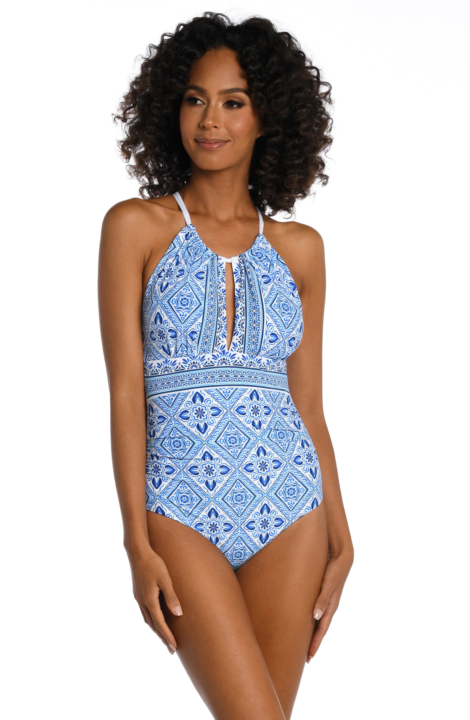 Model is wearing a light blue artful mosaic printed one piece swimsuit from our Mediterranean Breeze collection.