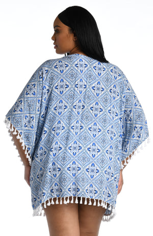 Model is wearing a light blue artful mosaic printed kimono swimsuit cover up from our Mediterranean Breeze collection.
