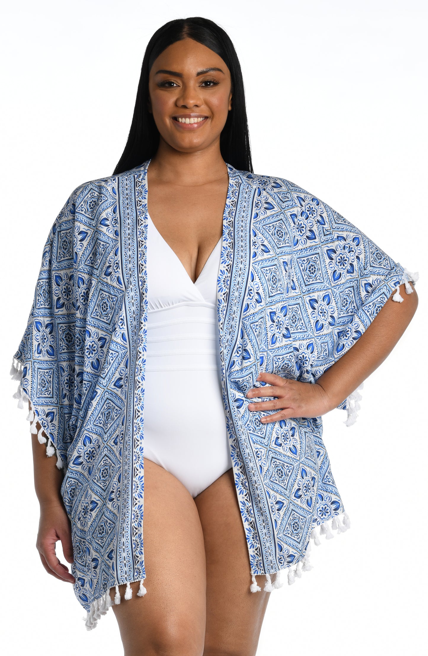 Model is wearing a light blue artful mosaic printed kimono swimsuit cover up from our Mediterranean Breeze collection.