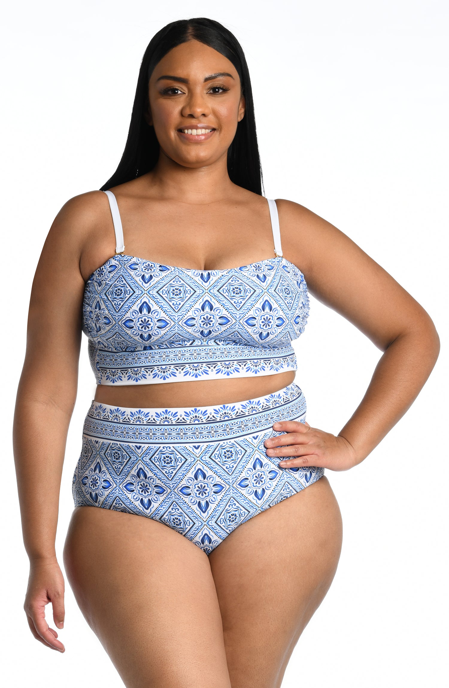 Model is wearing a light blue artful mosaic printed midkini swimsuit top from our Mediterranean Breeze collection.