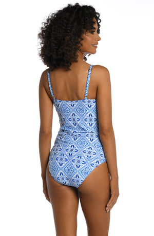 
            
                Load image into Gallery viewer, Model is wearing a light blue artful mosaic printed tankini swimsuit top from our Mediterranean Breeze collection.
            
        
