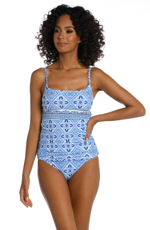 
            
                Load image into Gallery viewer, Model is wearing a light blue artful mosaic printed tankini swimsuit top from our Mediterranean Breeze collection.
            
        