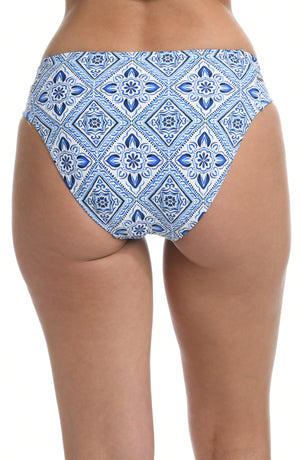 Model is wearing a light blue artful mosaic printed side shirred swimsuit bottom from our Mediterranean Breeze collection.