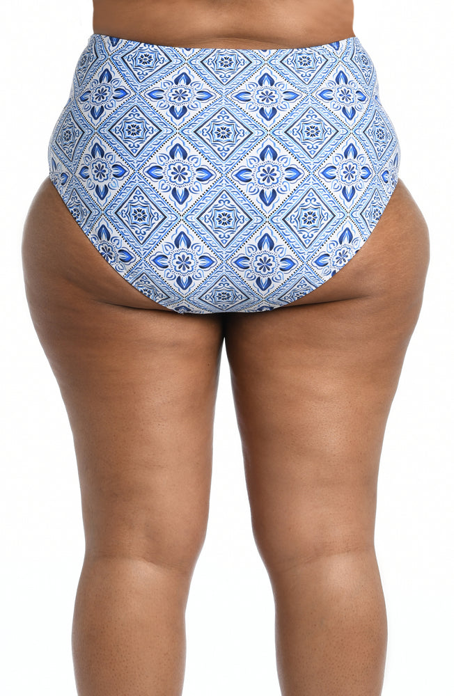 
            
                Load image into Gallery viewer, Model is wearing a light blue artful mosaic printed high waist swimsuit bottom from our Mediterranean Breeze collection.
            
        