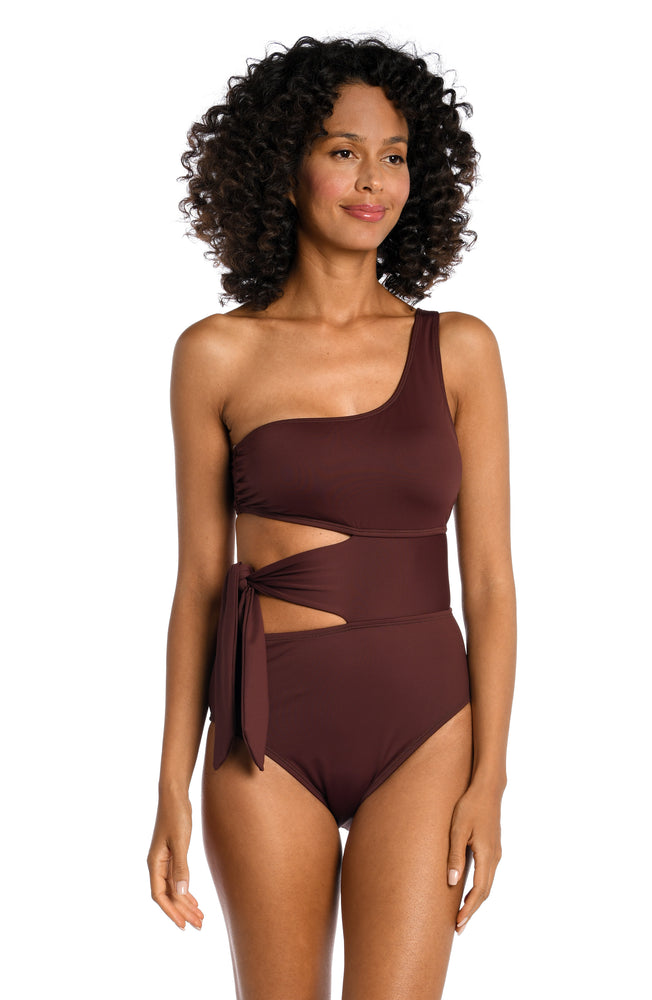 
            
                Load image into Gallery viewer, Model is wearing a java colored one piece swimsuit from our Best-Selling Island Goddess collection.
            
        