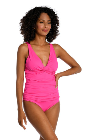 
            
                Load image into Gallery viewer, Model is wearing a pop pink colored tankini swimsuit top from our Best-Selling Island Goddess collection.
            
        