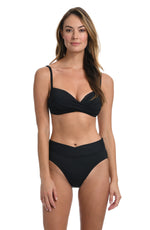 Model is wearing a black over the shoulder swimsuit top from our Best-Selling Island Goddess collection.