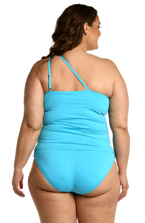 
            
                Load image into Gallery viewer, Model is wearing a azul (light blue) colored keyhole tankini swimsuit top from our Best-Selling Island Goddess collection.
            
        