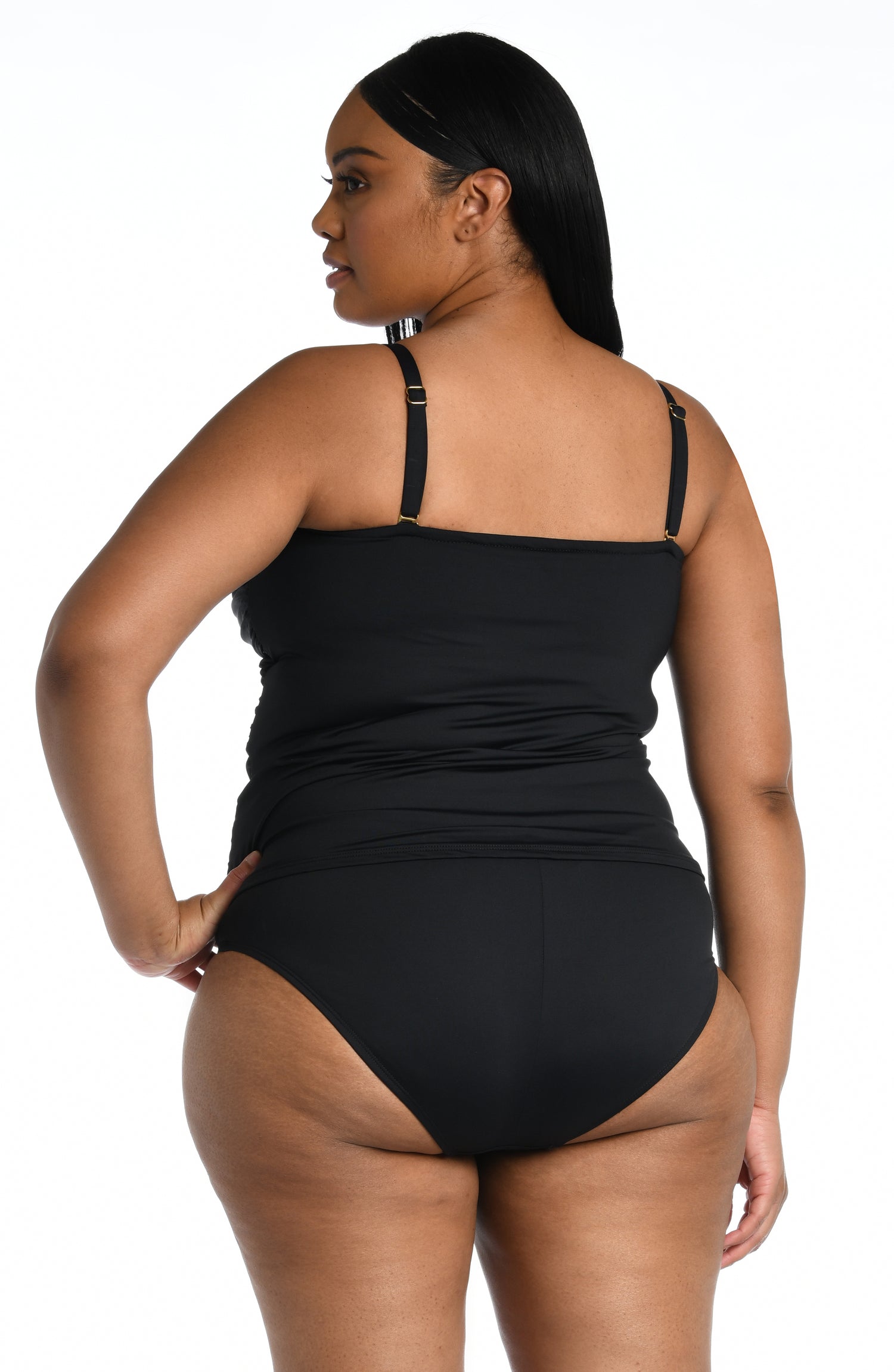 Model is wearing a black bandeau tankini swimsuit top from our Best-Selling Island Goddess collection.