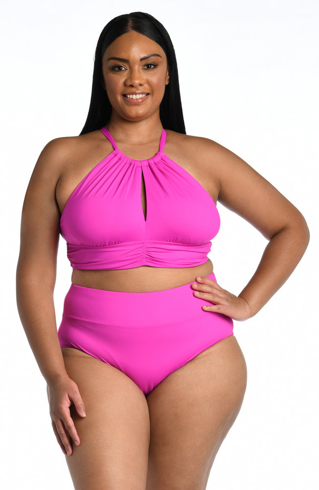 Model is wearing a orchid colored midkini swimsuit top from our Best-Selling Island Goddess collection.