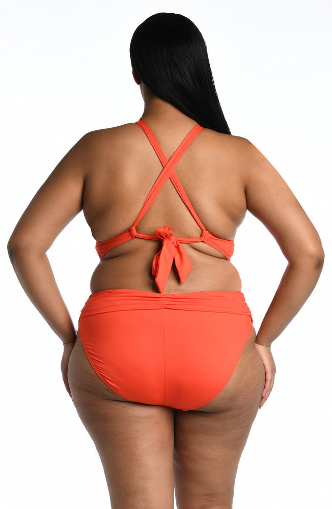 Model is wearing a paprika colored midkini swimsuit top from our Best-Selling Island Goddess collection.