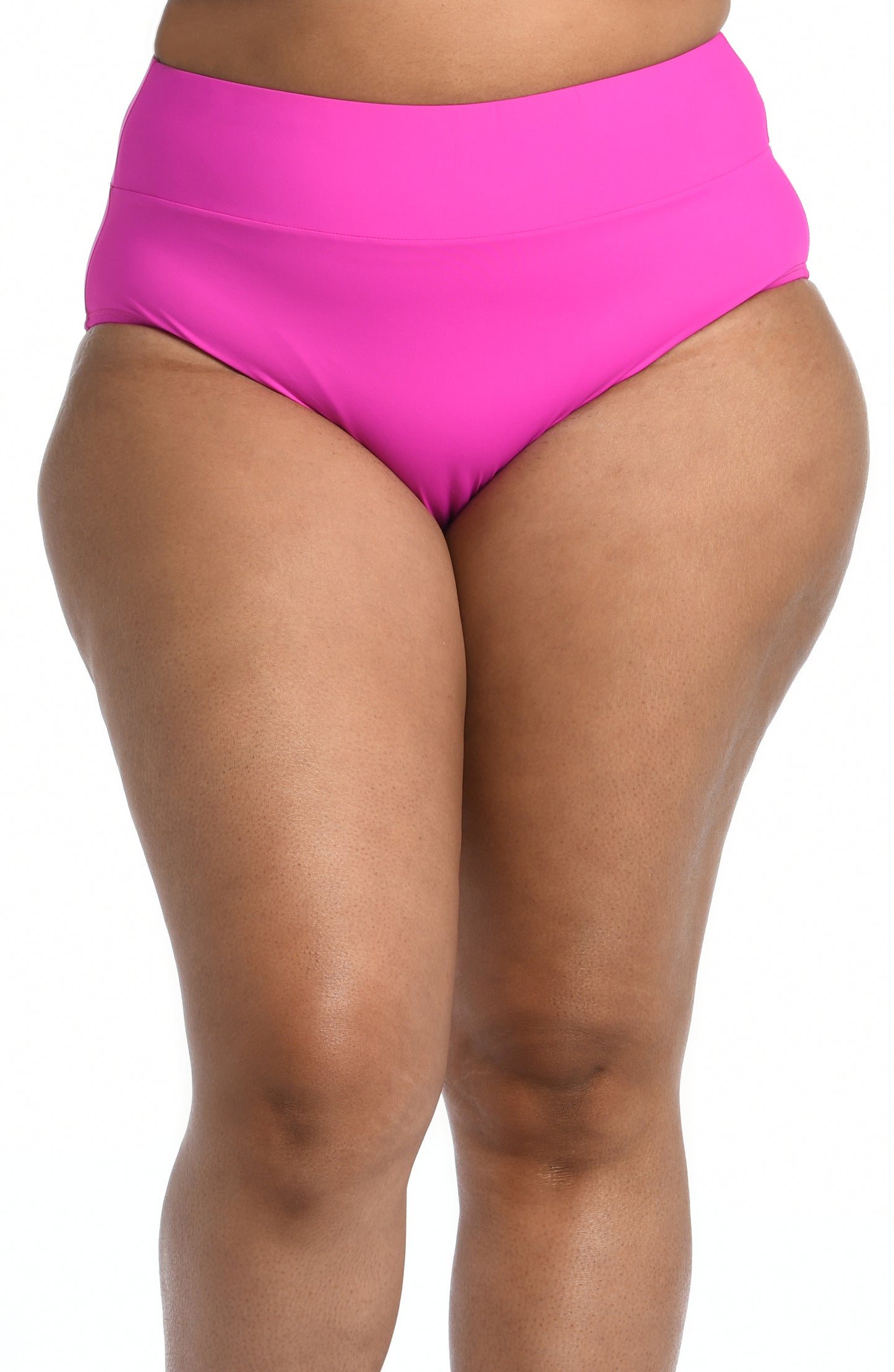 Model is wearing a orchid colored high waist swimsuit bottom from our Best-Selling Island Goddess collection.