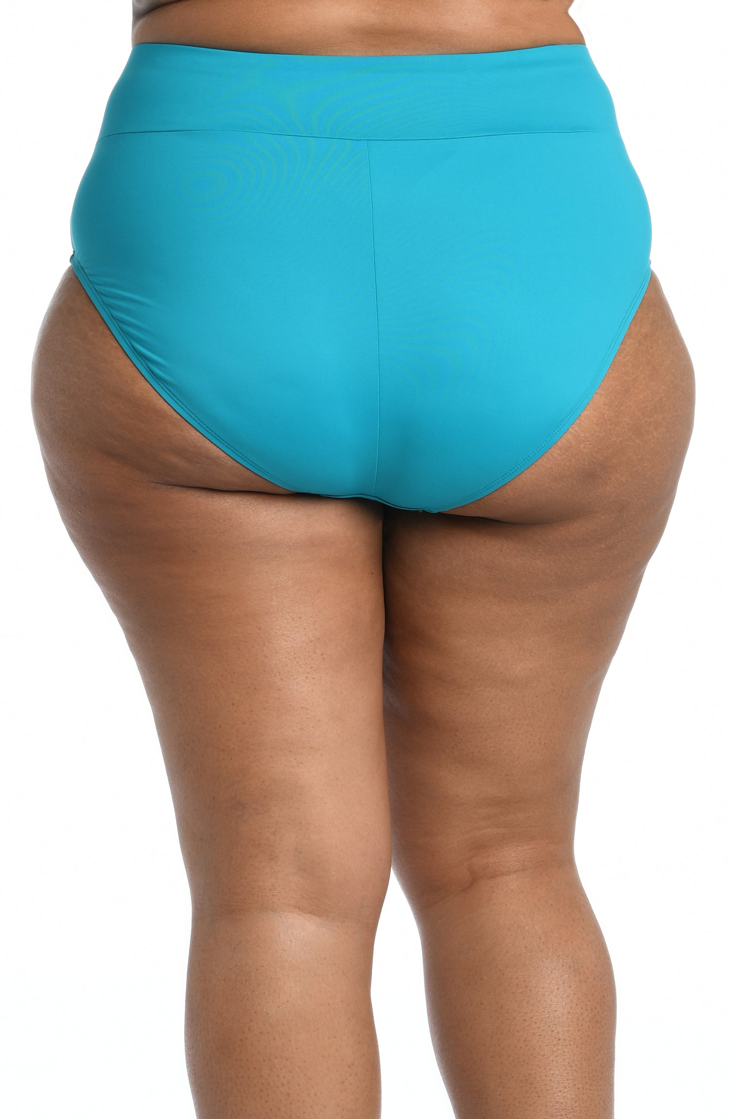 Model is wearing a turquoise colored high waist swimsuit bottom from our Best-Selling Island Goddess collection.