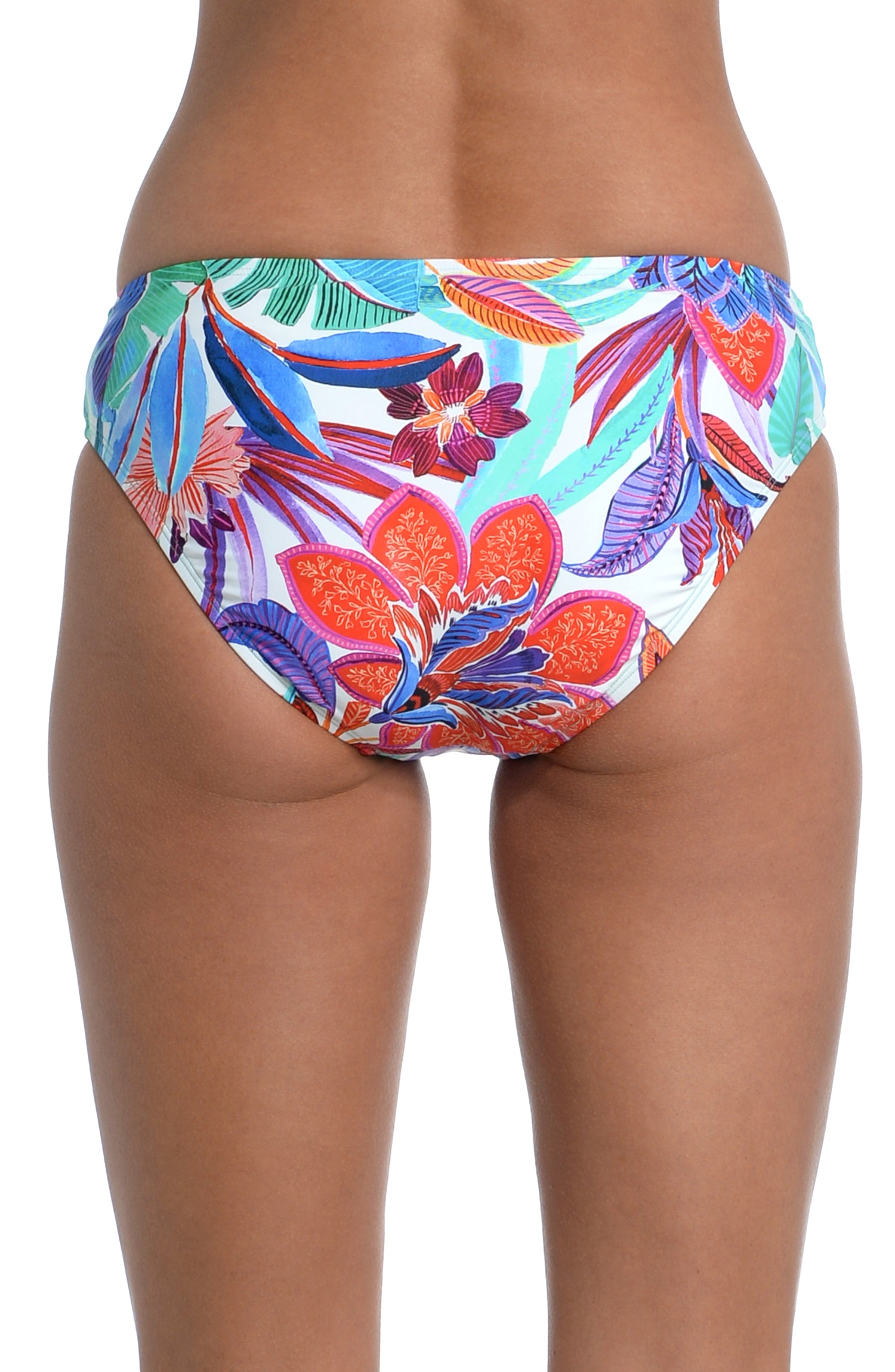 Model is wearing a vibrant multi-colored tropical printed shirred hipster bottom from our Tropics of Tropez collection!